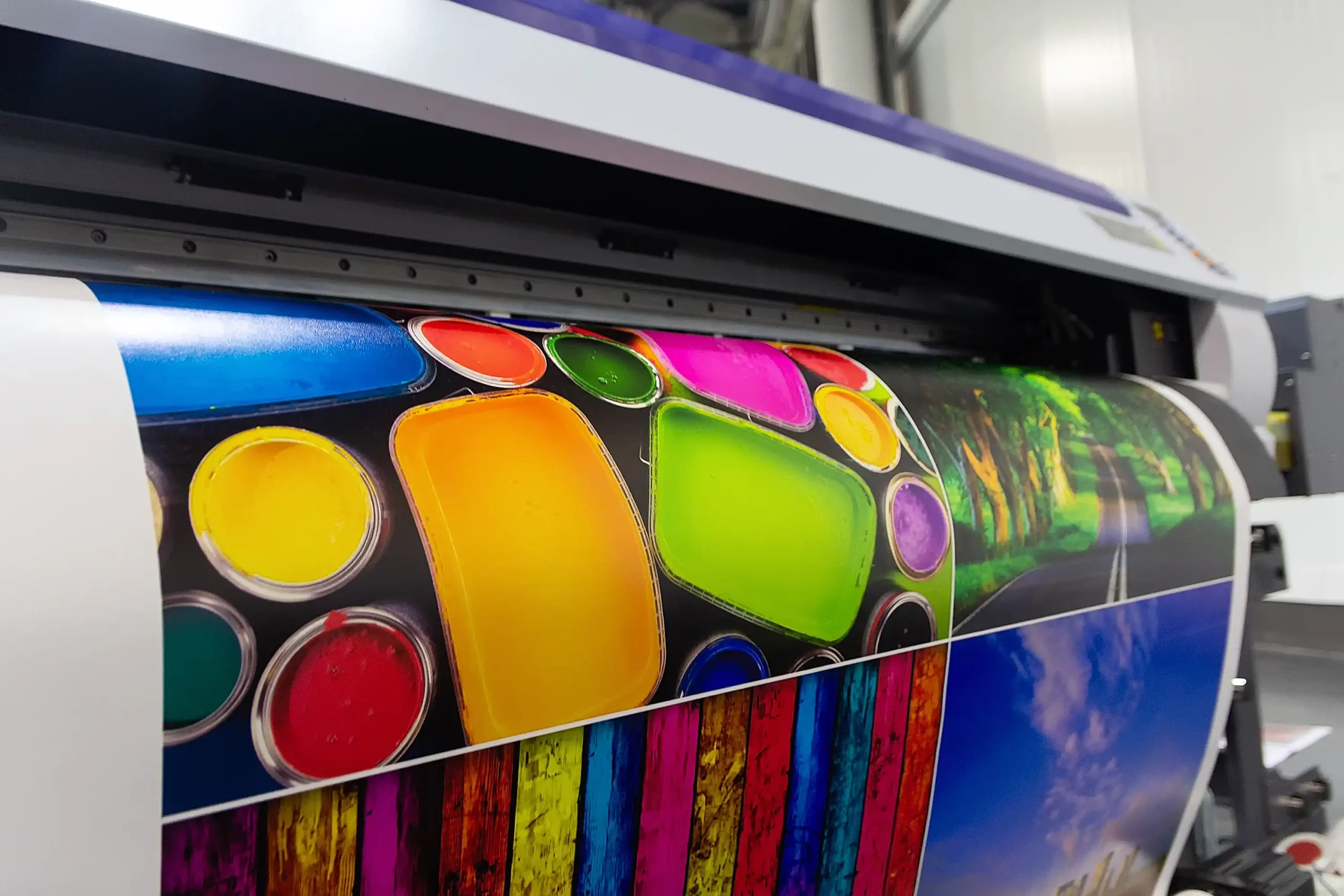 kcopylarge format printing machine in operation. industry